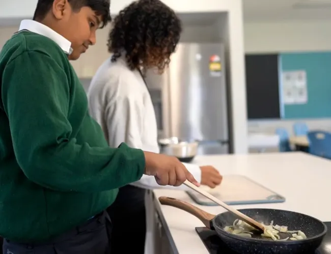 Student learning to cook
