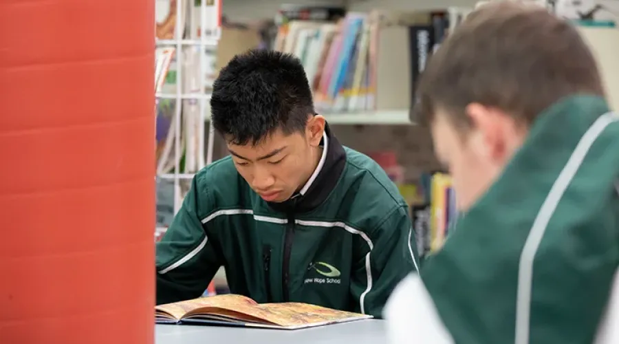 Students enjoying time in the library